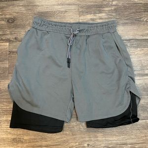 New athletic shorts in size L.